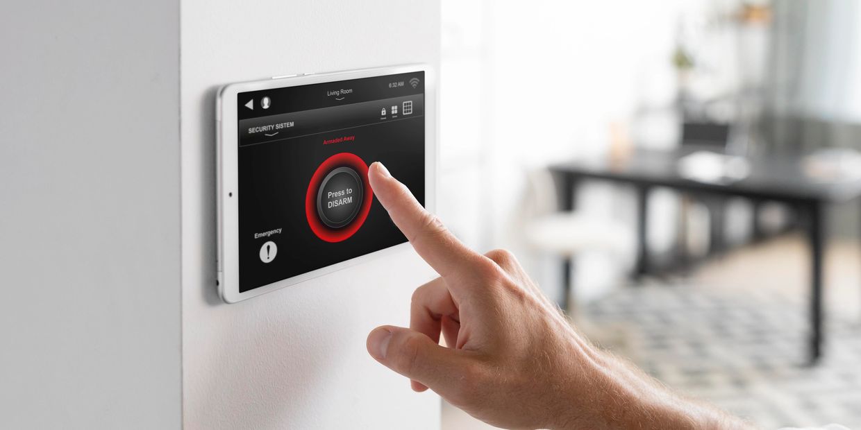 Man using a tablet in his smart home
