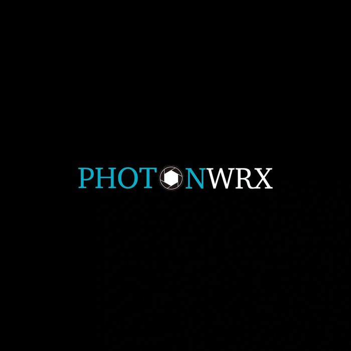 Logo of PHOTONWRX with a camera shutter icon.