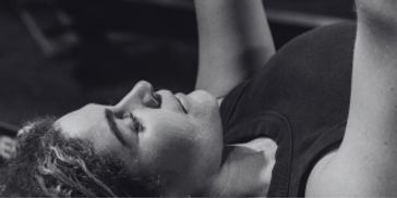 Picture of a member doing a bench press.