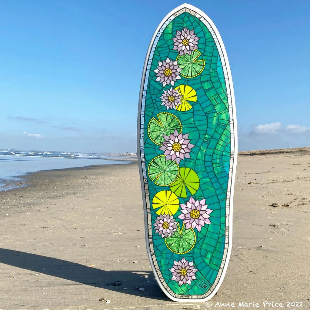 Lotus stained glass mosaic surfboard by Anne Marie Price.