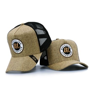 Two brown and black Battalion Livestock branded caps.