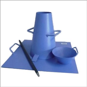 A blue plastic art stencil kit with shapes and tools on a mat.