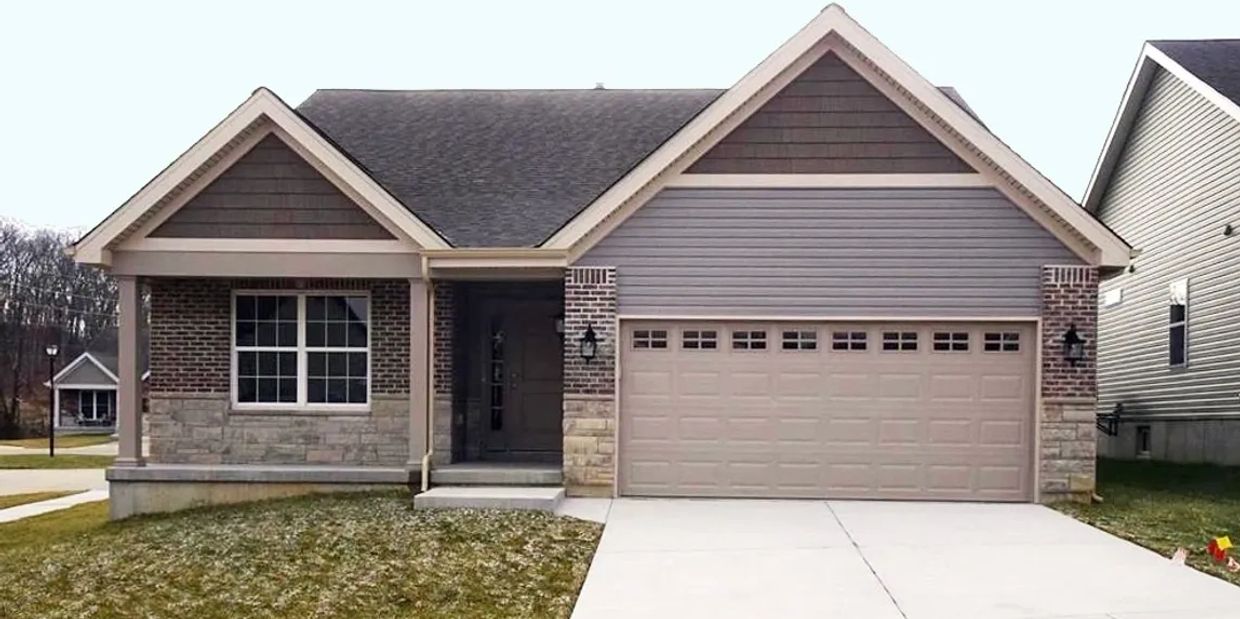 A view of a house with a garage