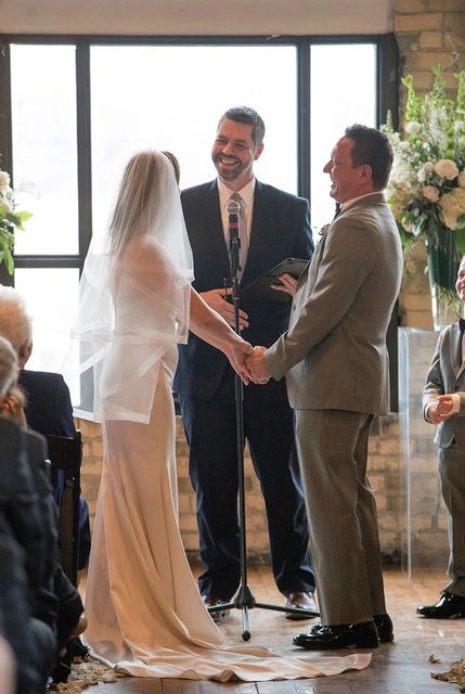 Happy bride and groom with Philip JW Smith Officiant 
