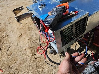 RV Furnace with equipment attached while servicing and bench testing unit in Colorado