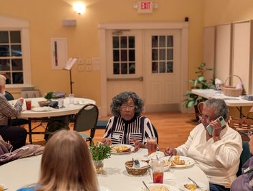 Neighbors gather to build community. 