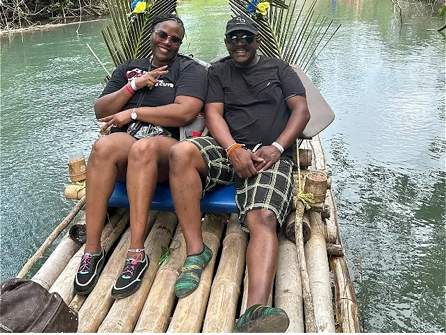 Happy couple doing Martha Brae tour in Jamaica.
