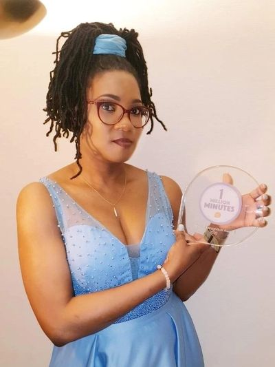 A CEO winning an award for her services for social inclusion & tackling loneliness for widows.