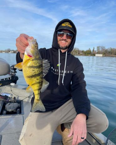 Kevin with a beauty perch on a live minnow.