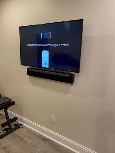 TV and sound bar installation for your home gym. Your home gym needs this!