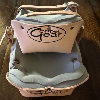 A picture of grey colored carpet gear