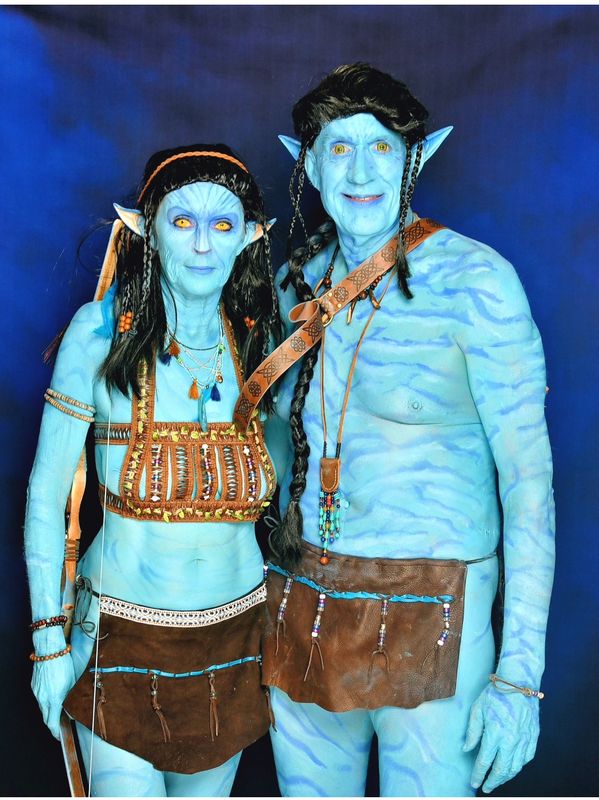 Costumes A couple dressed as blue Na'vi characters from the movie Avatar.