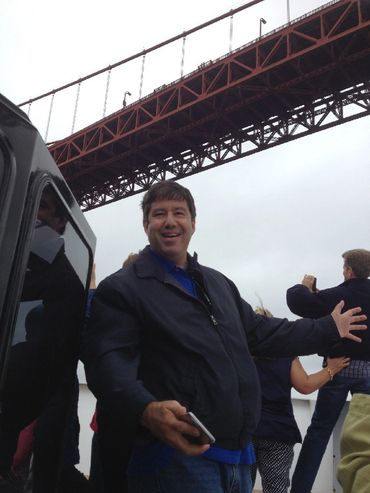 Man under Golden Gate Bridge