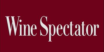 Wine Spectator logo on a burgundy background.