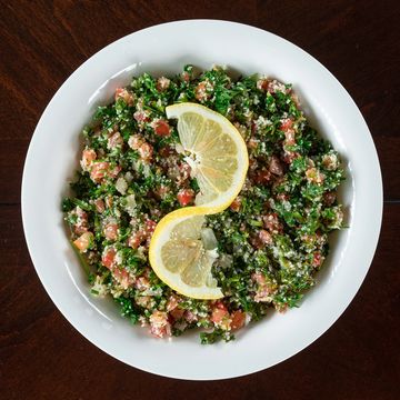A traditional mediterranean parsley salad with tomatoes, cracked wheat, and lemon juice.

