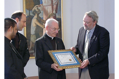 A Cardinal accepts a carbon offset certificate