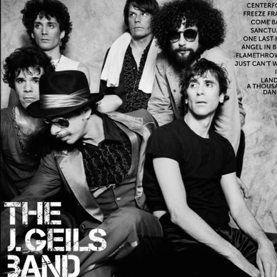 Black and white photo of The J. Geils Band members posing together.