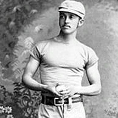 Vintage photo of a young man in a cap and fitted shirt.