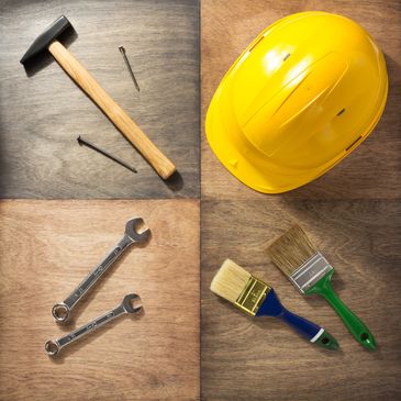 Construction tools and safety gear on wooden panels collage.