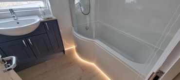 Bathroom recently completed for a local reputable plumber/bathroom installer.
The bath panel was rai