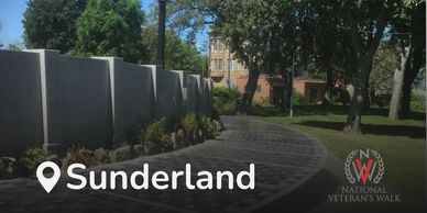 National Veteran's Walk in Sunderland with a curved path and memorial wall.