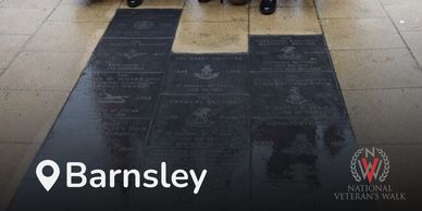 Memorial plaques for various regiments at National Veteran's Walk in Barnsley.