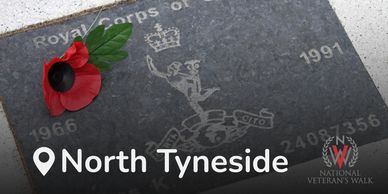 Memorial plaque with poppy flower at National Veteran's Walk, North Tyneside.