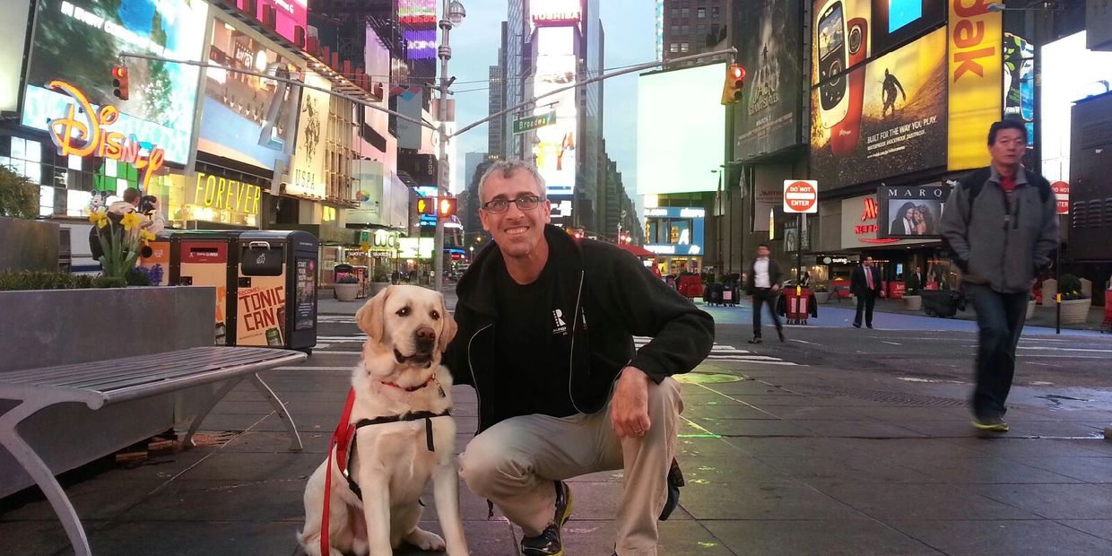 Trainer posing for a picture after dog training in Atlanta, GA.