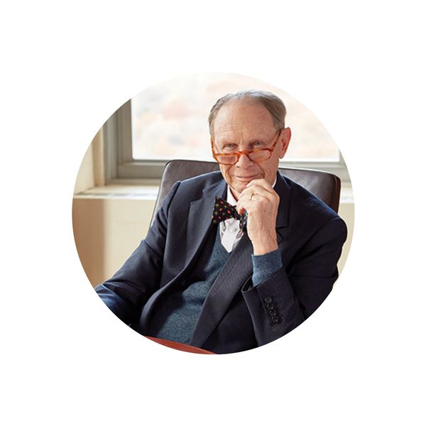Older man with glasses and bow tie.
