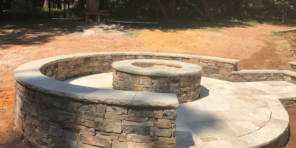 Stone patio with fire pit & seat walls
