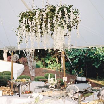Wedding floral chandelier over buffet
