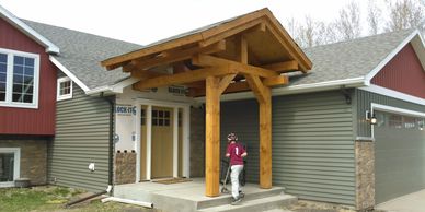 Timber frame porch roof, custom design and build