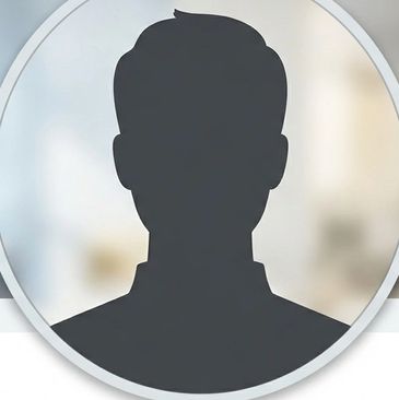 Generic silhouette profile icon on blurred background.