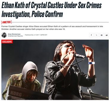 Ethan Kath of Crystal Castles performing live on stage with a keyboard player.