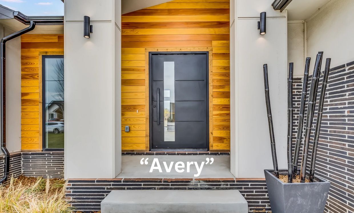 A pivot door on the entry of a wood house