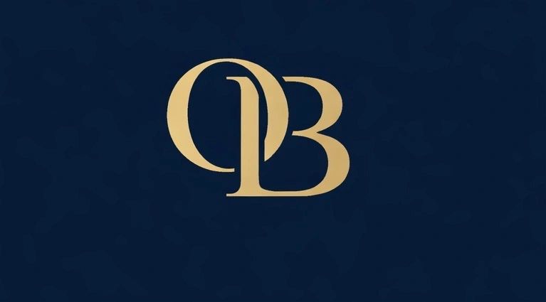 Elegant gold intertwined letters OB on a dark blue background.