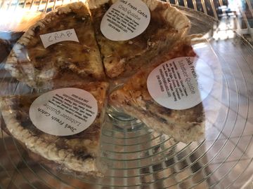 Quiche by the slice, a fifth of the full pie.