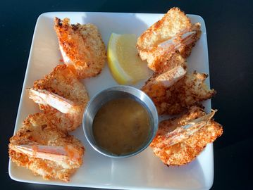 Coconut Shrimp, shown here w Mango Fish Sauce, also available Gluten Free (add $2)