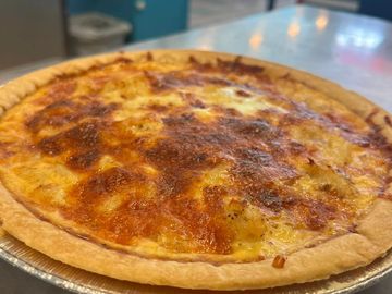 Whole quiche, order ahead or find freshly baked, Crab or Lobster available.