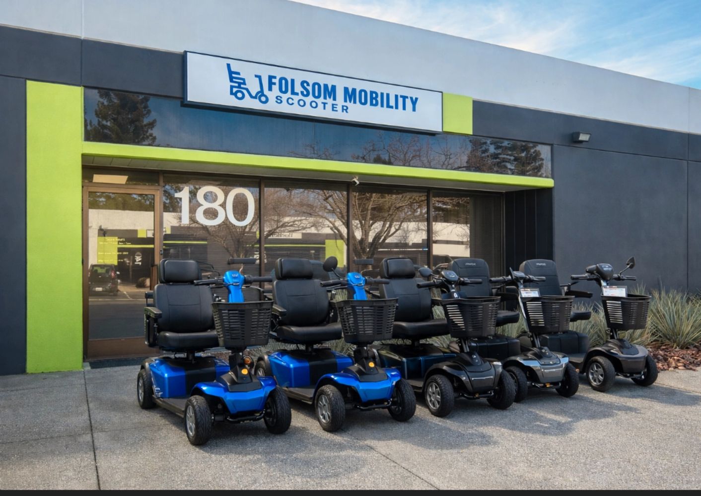 Row of mobility scooters outside Folsom Mobility Scooter store.