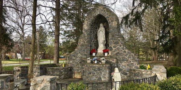 Our Lady of Lourdes and St. Bernedette in the grotto on the campus of Notre Dame de Lourdes parish.