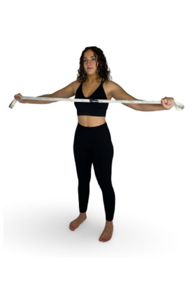 Girl doing standing fly with long band