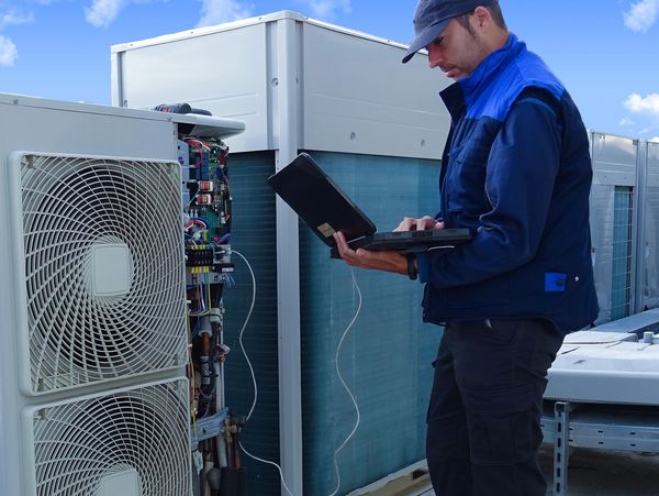 Seasonal commercial RTU maintenance, belt replacement, and coil cleaning in Greenfield, WI by A-1.