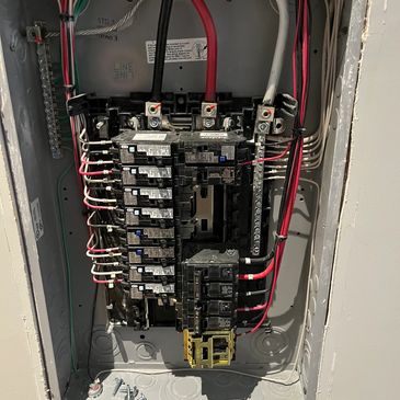 Commercial loadcenter with dedicated circuits for an oven, microwave, kitchen, and lighting.