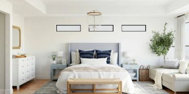 Modern bedroom with a cozy bed and soft lighting.