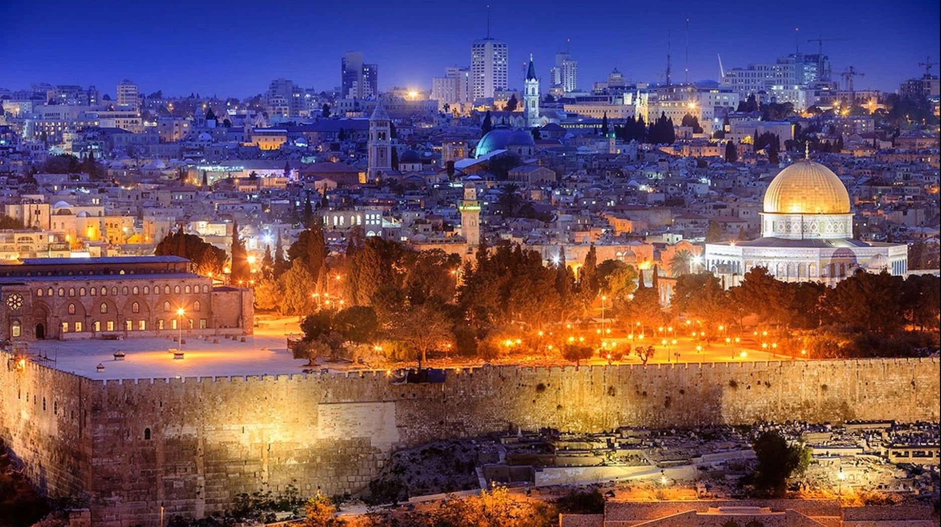 chef at home with Skyline old city Jerusalem at night. 