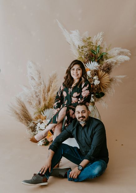 Owners of boxwood event rentals Susan Diaz & Hector Diaz with pampas bohemian floral arrangements. 
