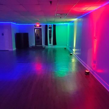 A room with multicolored lights