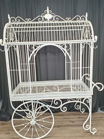 This beautiful cart is designed with elegance in mind. It is made out of quality metal and hand-pain