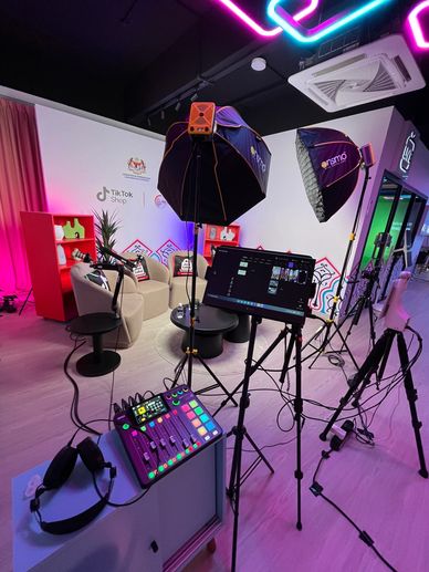 A professional TikTok shop recording studio setup with lighting and audio equipment.
